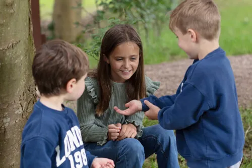 Children enjoying playtime outdoors at Roxburghe Hotel Golf & Spa.