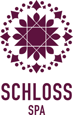 Logo of Schloss Spa, a luxurious wellness center.